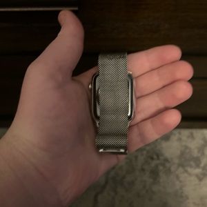 Apple Watch Series 9 stainless steel plus Bluetooth headphones soundproof